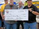 ARRL Southwestern Division Vice Director Ned Stearns, AA7A (left), accepts an ARRL Spectrum Defense Fund donation from the ARA's Brian McCarthy, AK7F.